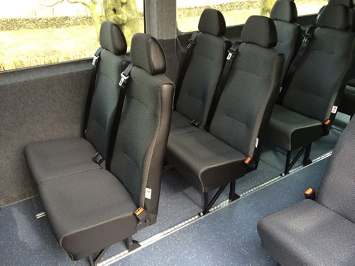 Semi-high back seat, trimmed in cloth and vinyl, trimmed headrest - Minibus Options Semi-high back seat, trimmed in cloth and vinyl, trimmed headrest