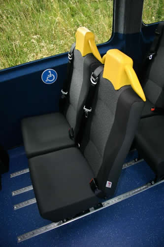 Semi-high back seat, trimmed in cloth and vinyl, twin grab headrest - Minibus Options Semi-high back seat, trimmed in cloth and vinyl, twin grab headrest