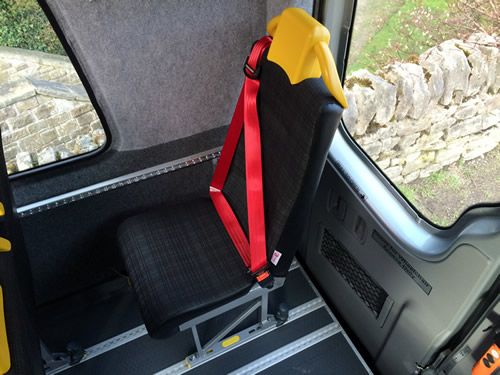 Semi-high back seat, trimmed in cloth, twin grab headrest, red webbing - Minibus Options Semi-high back seat, trimmed in cloth, twin grab headrest, red webbing