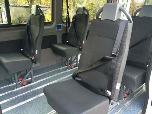 Semi-high back seat, trimmed in cloth and vinyl, twin grab headrest - Minibus Options Semi-high back seat, trimmed in cloth and vinyl, twin grab headrest