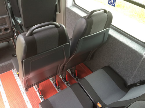 High back seat, trimmed in cloth, top mounted grab handle, ABS back - Minibus Options High back seat, trimmed in cloth, top mounted grab handle, ABS back