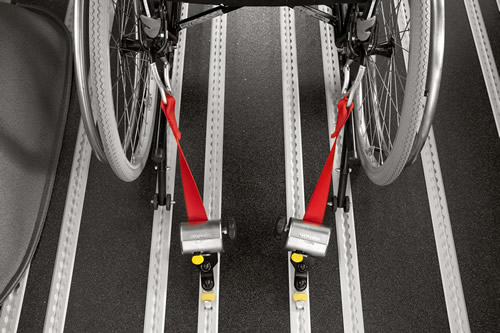 The retractable rear cassette fixing ensures the wheelchair is ‘braced’ against the front fixings - Minibus Options The retractable rear cassette fixing ensures the wheelchair is ‘braced’ against the front fixings